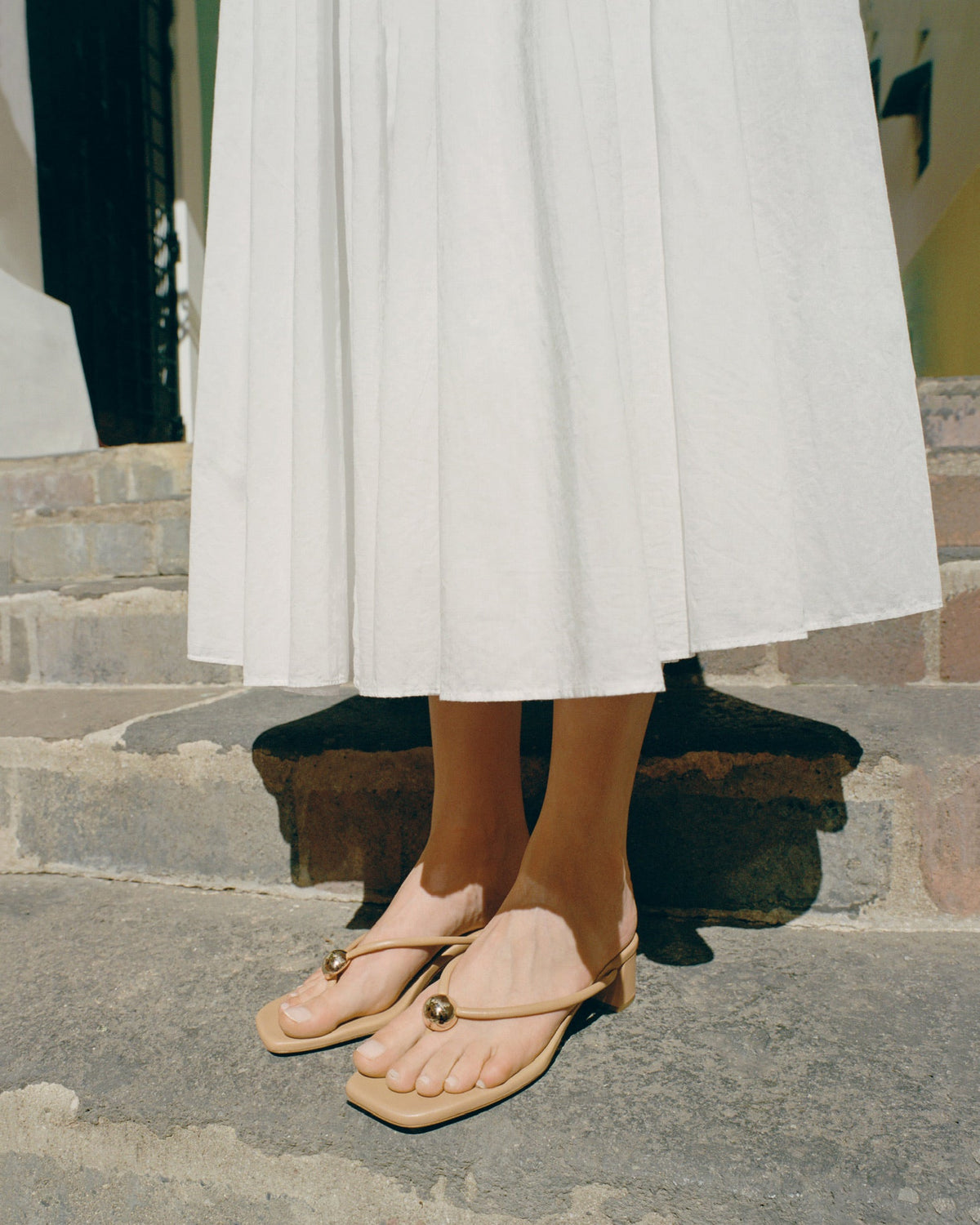 Odessa Dune Leather Heeled Sandal in dune tan leather with a gold ball accent.