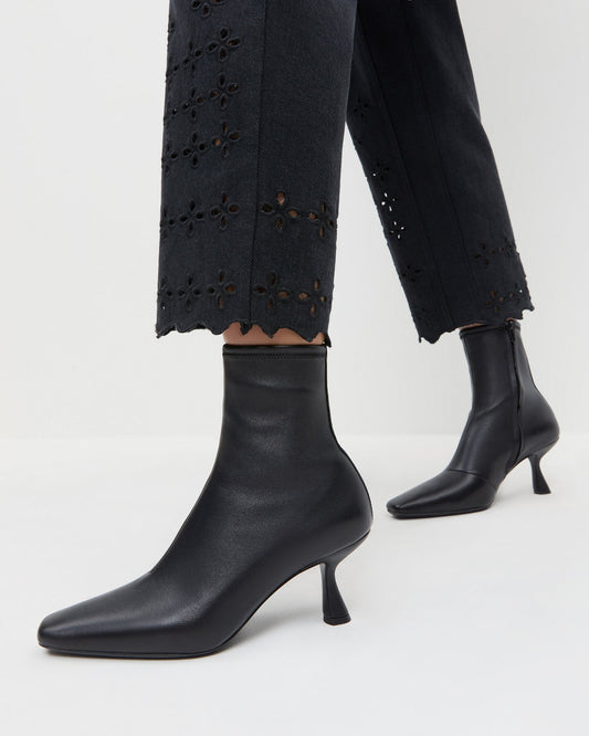 Thandy Black Leather Curved Heel Bootie