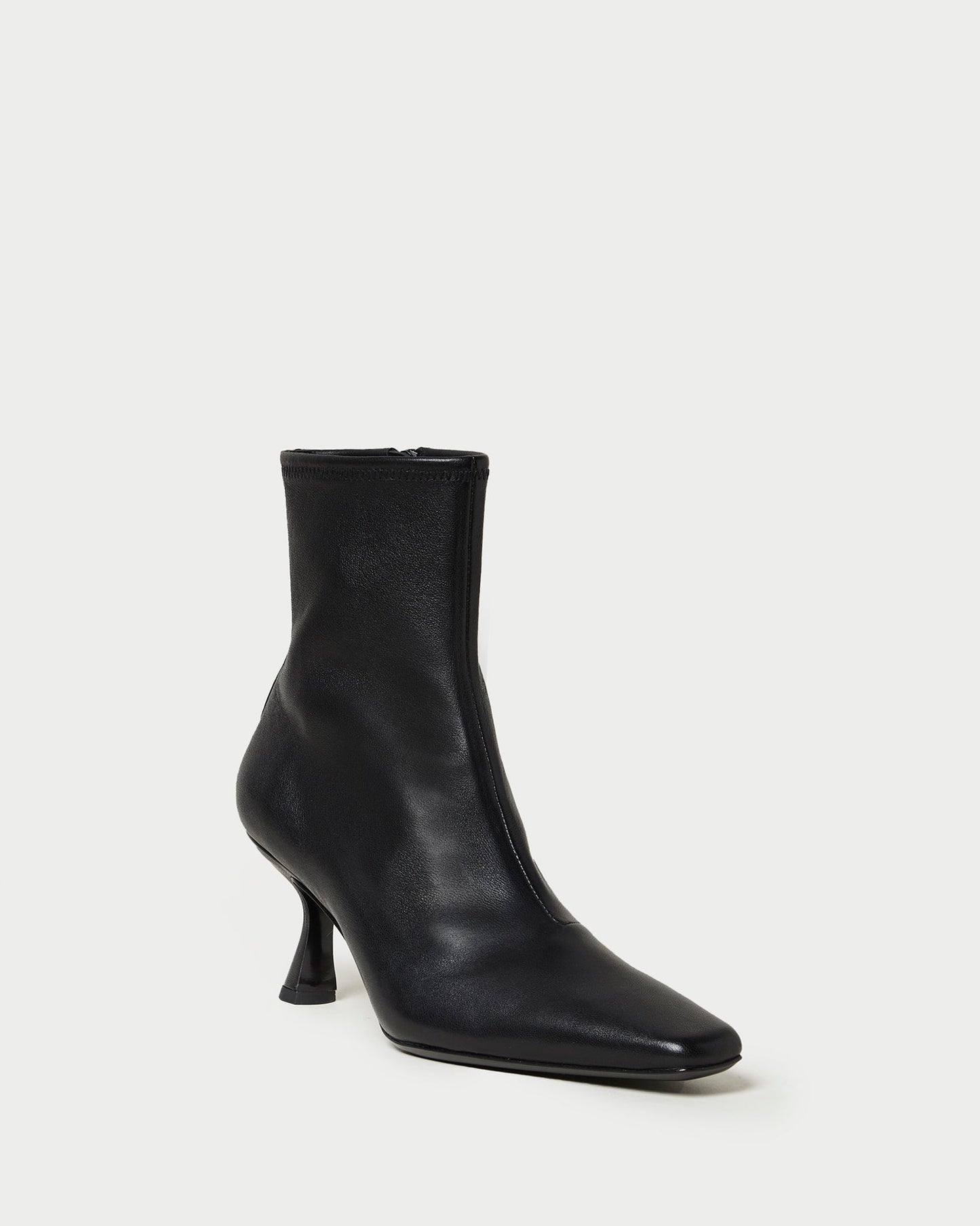 Thandy Black Leather Curved Heel Bootie
