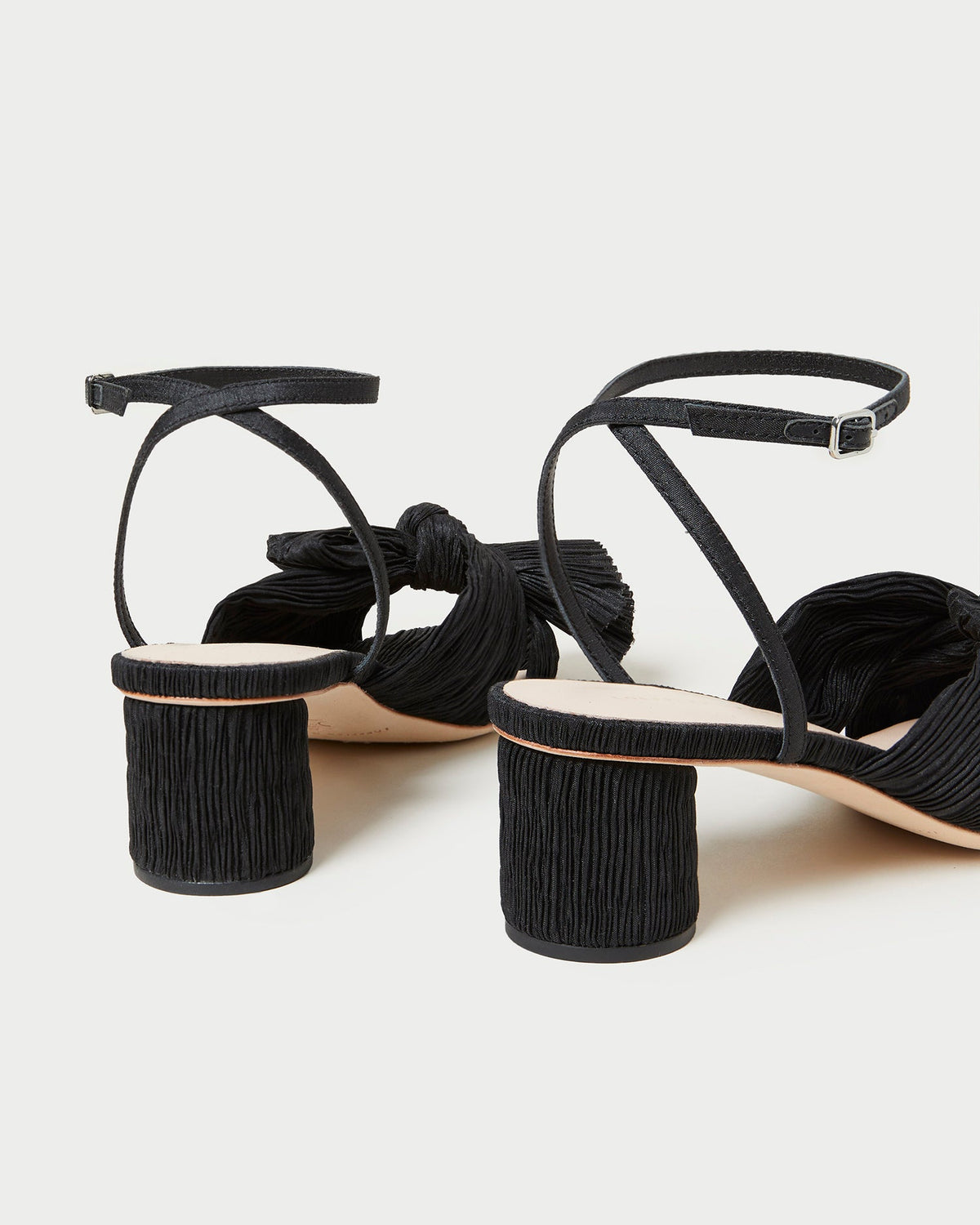 Dahlia Black Pleated Bow Heel in black pleated organza fabric.