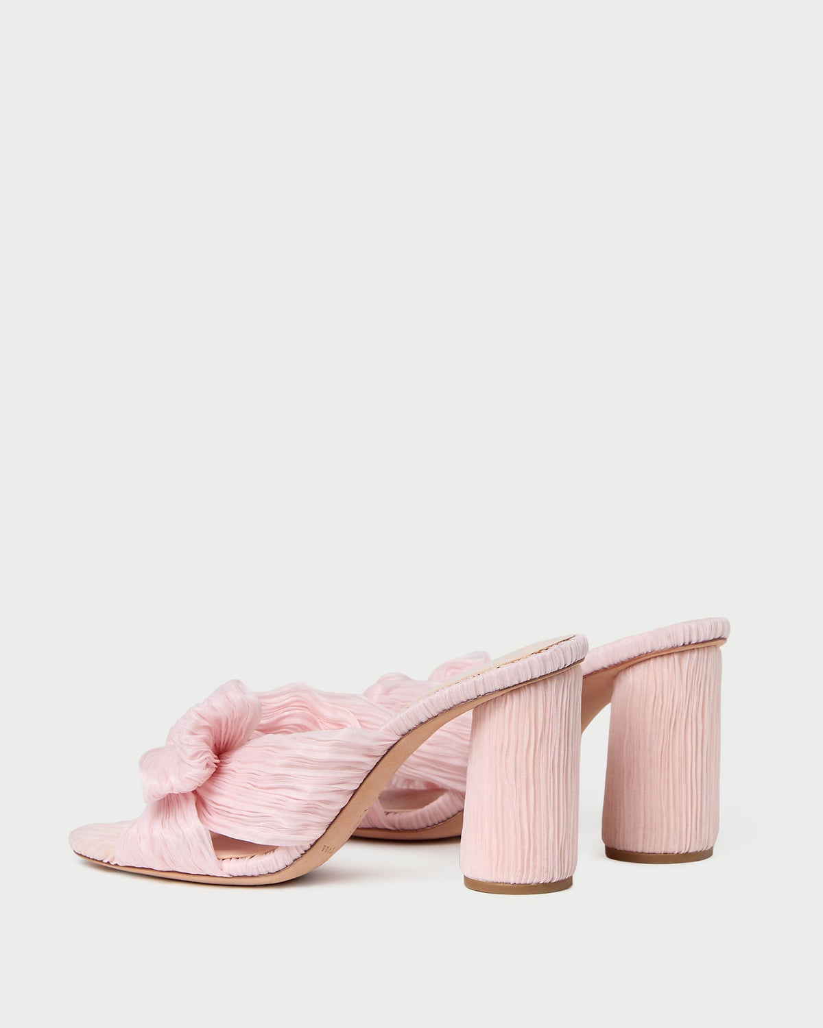 Penny Pink Pleated Organza Bow Heel in pale pink organza fabric.