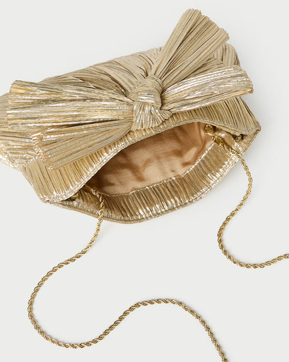 Rayne Gold Bow Clutch in pleated gold fabric.