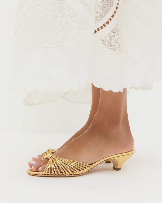 Dixie Gold Leather Kitten Heel in gold metallic leather.