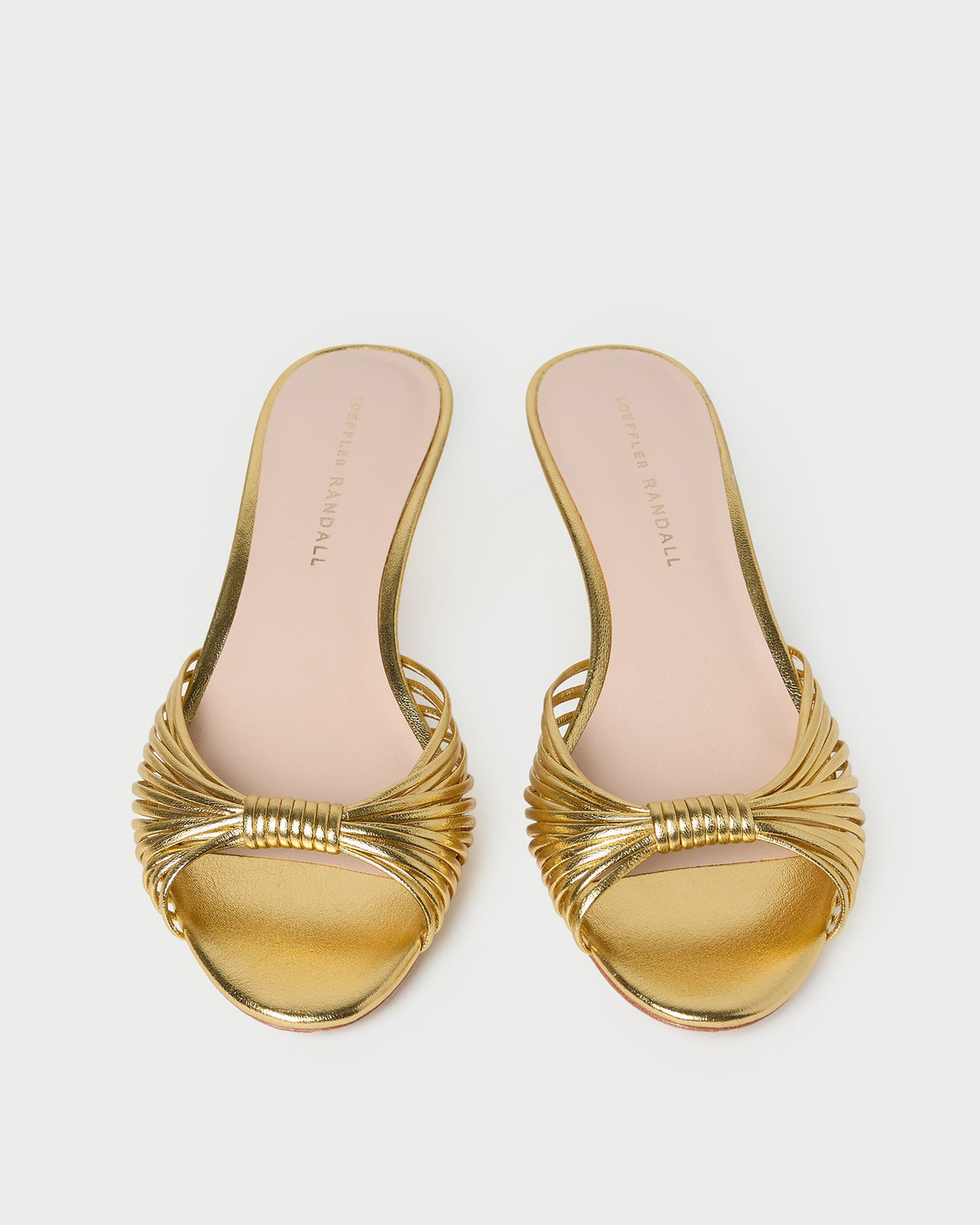 Dixie Gold Leather Kitten Heel in gold metallic leather.