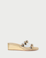 Enya Gold/Champagne Studded Wedge in gold leather.
