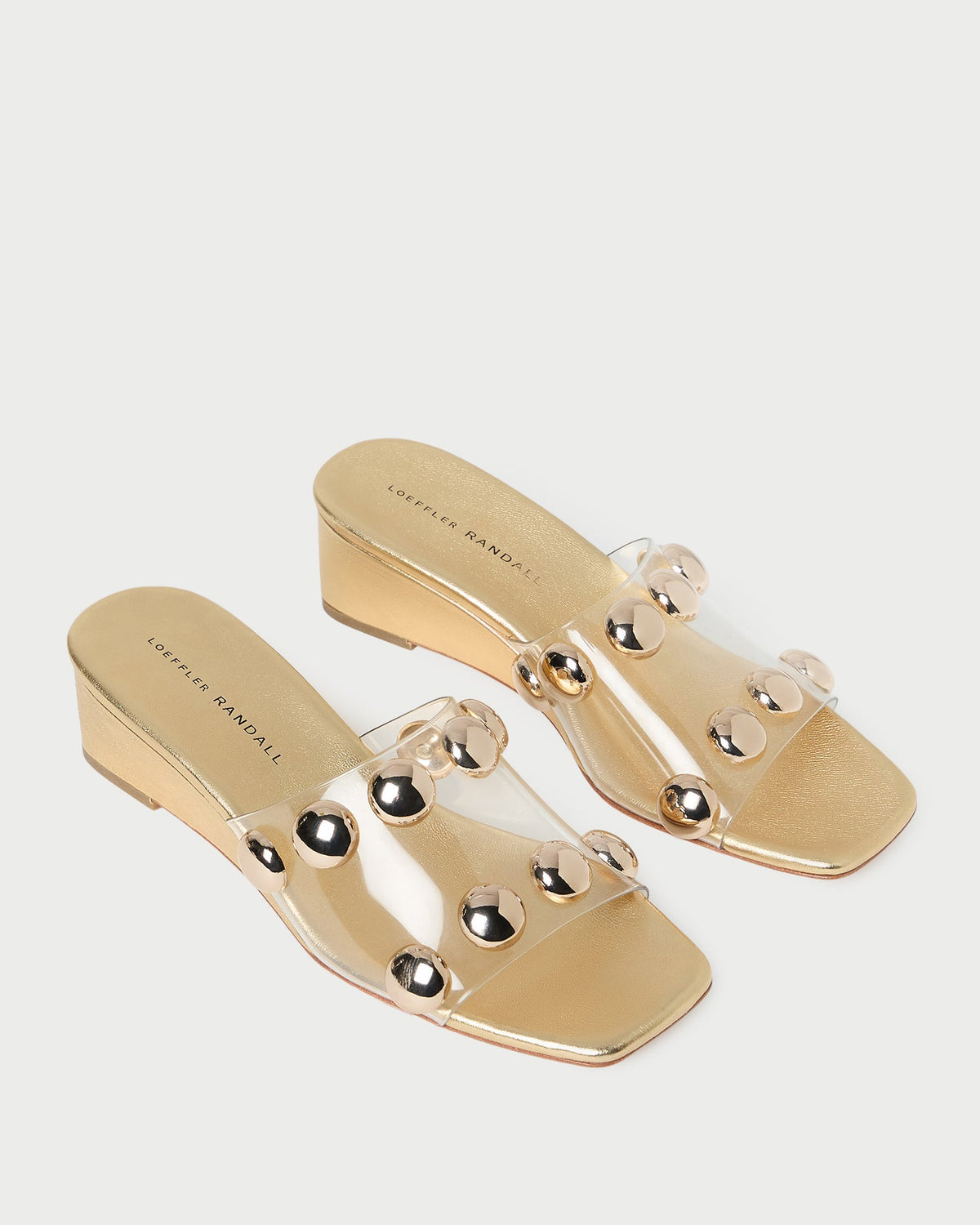 Enya Gold/Champagne Studded Wedge in gold leather.