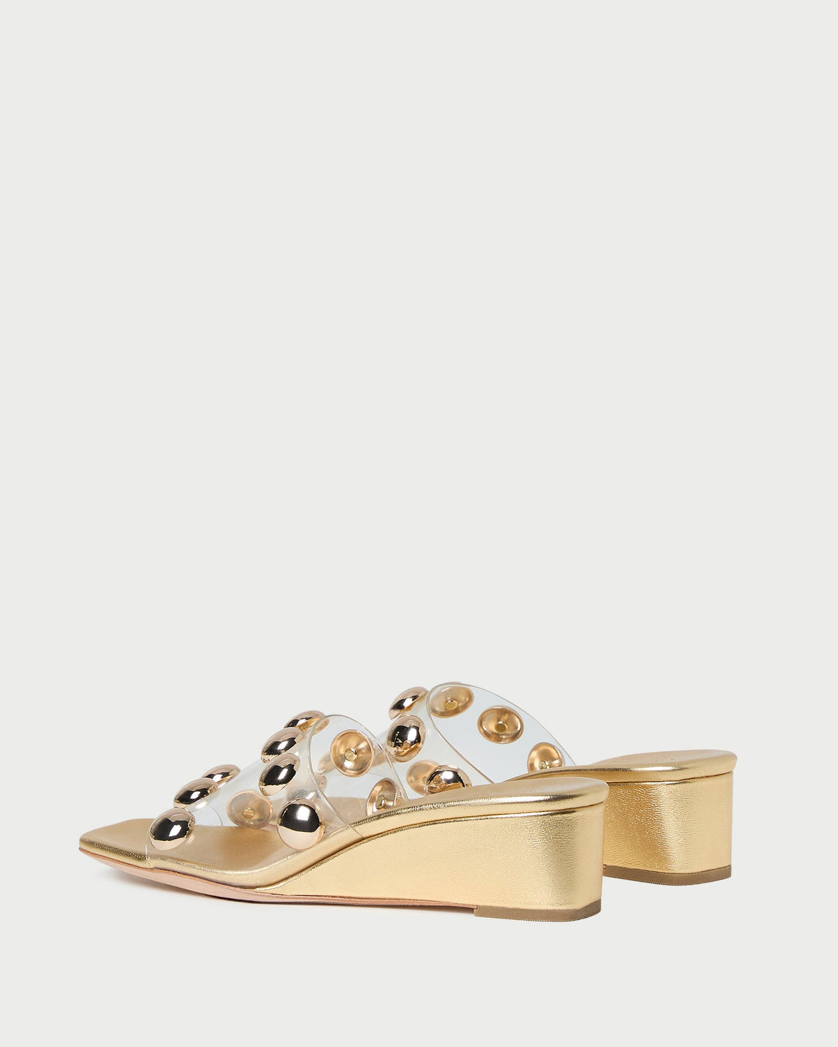 Enya Gold/Champagne Studded Wedge in gold leather.
