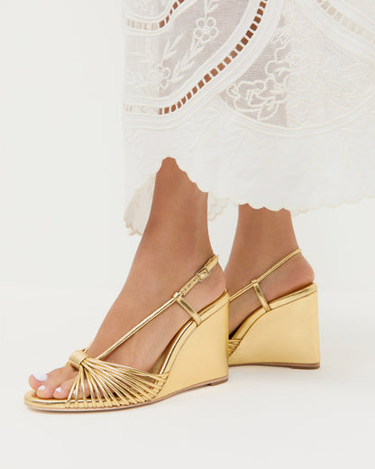 Marren Gold Leather Wedge in gold metallic leather.