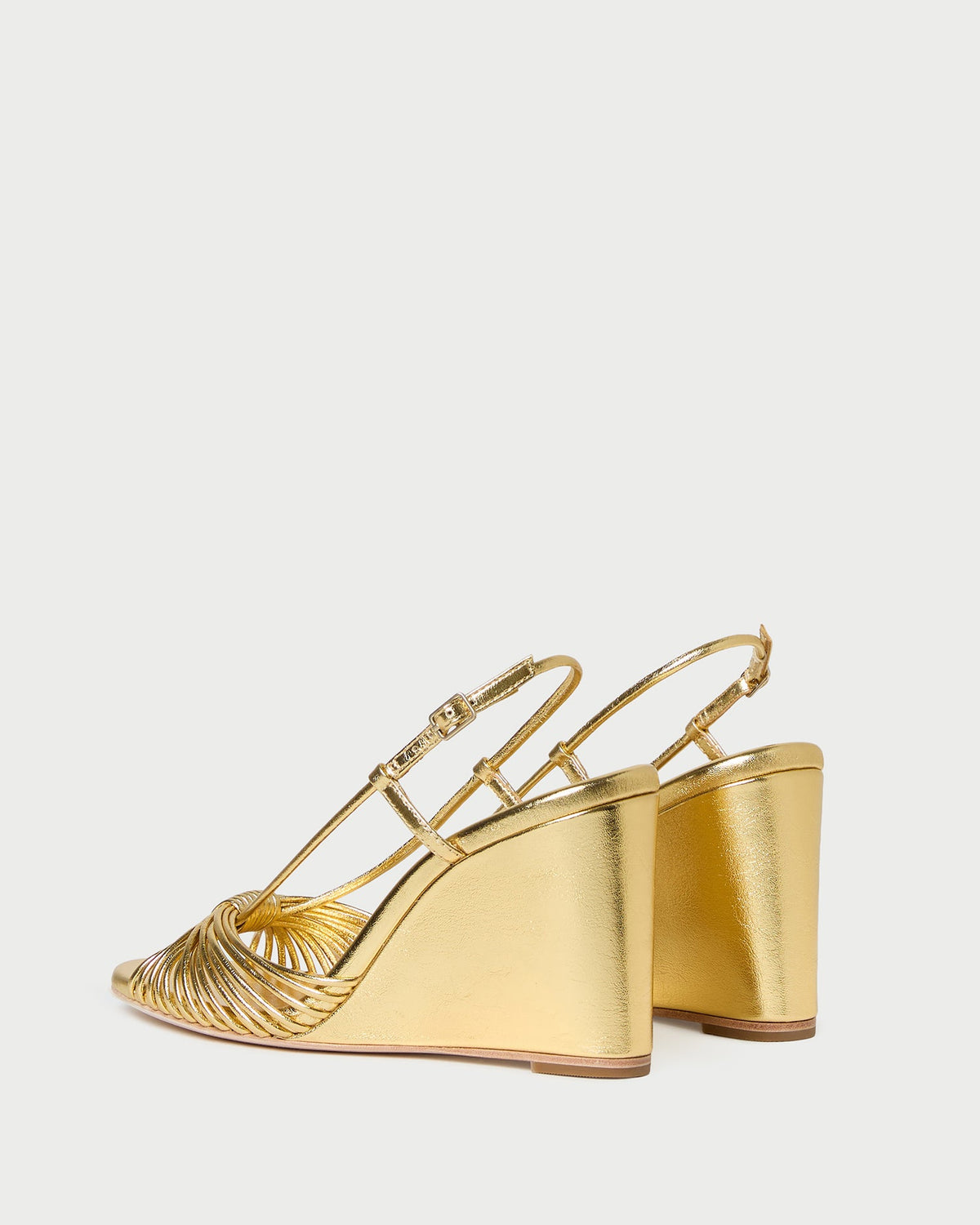 Marren Gold Leather Wedge in gold metallic leather.