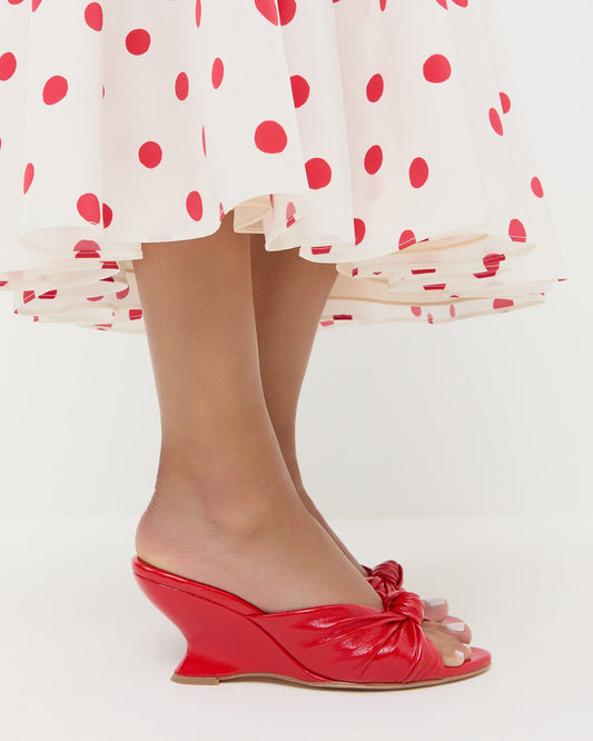 Marsy Leather Knot Wedge in Red and Nissa Dress in white and red polka dot silk.